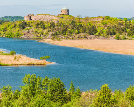 Bohus Fortress overlooking the serene river landscape in Sweden during a clear day