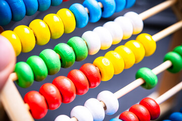 Colorful Wooden Abacus Close-Up for Educational Insights on Teaching Mathematics and Early Learning in Children, Perfect for Classroom and Home Use, Engaging Visual Aid