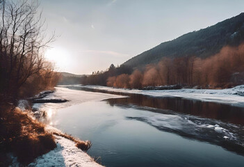 A tranquil winter sunset over a snow-covered river reflecting trees in a serene landscape