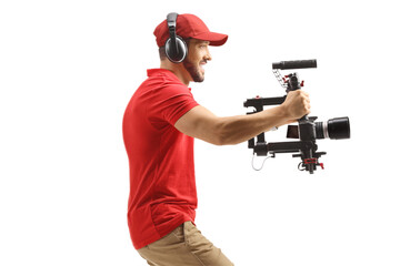 Camera operator using a stabilizer and recording