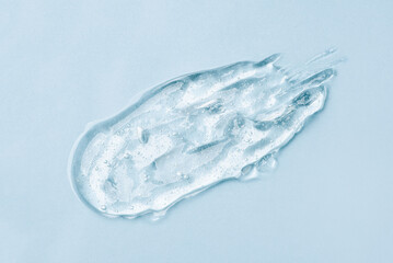 Transparent Skin care Product Smear on Blue Background