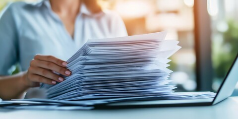 Close-up of a businesswoman’s hands sorting through a tall stack of documents in an office, representing organization, paperwork management, and administrative tasks in a professional , Generative AI