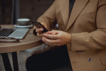Fototapeta premium fashion beard man portrait, tattoo hand, Handsome man beard using smartphone in hand, happy face, street photo, hipster style portrait, isolated, make video, instagram. facebook,USA, Bali, brutal