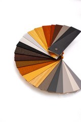 Samples of wooden blinds for windows in a store.