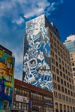 Spirit of SoHo mural by Misha Tyutyunik and Jeff Koons at 11 Howard Street. It is designed to celebrate the history and culture of SoHo in New York City, USA