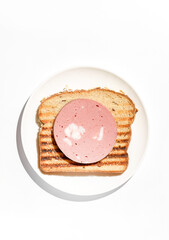 toast with sausage on a white background