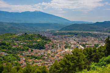 Fototapeta premium A view of Berat in Albania taken from Berat Castle. Mangalem quarter in foreground, part of the historic UNESCO listed area. Lagja 30 Vjetori district in the background, this is the more post-war