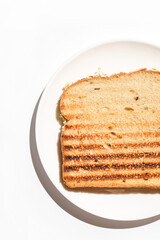 grilled toast on a white plate