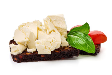 Soft greek feta cheese on a stone plate, isolated on white background