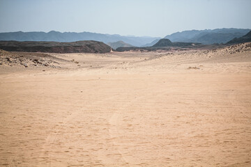 Dahab. image of the desert and mountains on the Sinai Peninsula at sunset. The Sinai Desert is an attraction accessible to vacationers of all resort areas of Charm. excursion in Egypt.