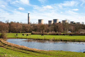 Pastoral landscape with power station cooling towers