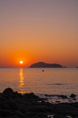 Sunrise over Jamjindo Island with Rocky Shoreline