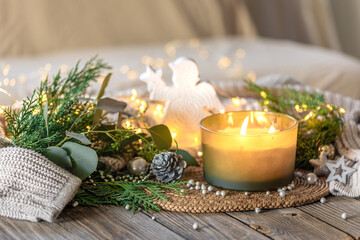 Cozy Christmas composition. Christmas candle.
