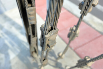 Close up steel turnbuckle and sling steel or Steel Wire Rope Sling and metal cable clamp connected...