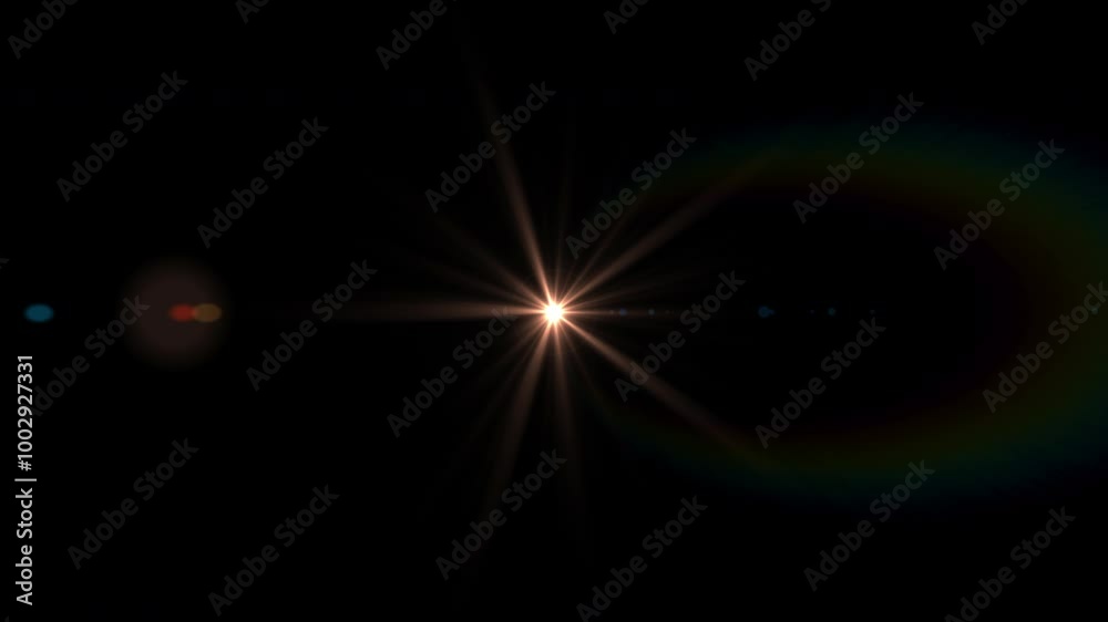 Wall mural a bright spike ball light source creating a starbust effect with colorful bokeh lights, rainbow iris