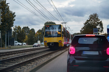 Fototapeta premium Yellow tram in the city, metro.