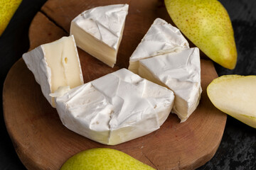 soft processed cheese with edible white mold