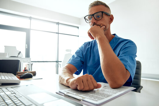 A medical professional is working diligently in a modern office to enhance health