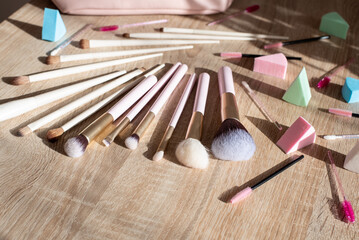 Flat lay composition with professional makeup brushes. Make-up artist kit