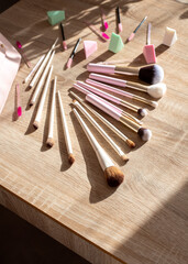 Flat lay composition with professional makeup brushes. Make-up artist kit