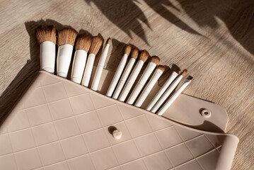 Flat lay composition with professional makeup brushes. Make-up artist kit
