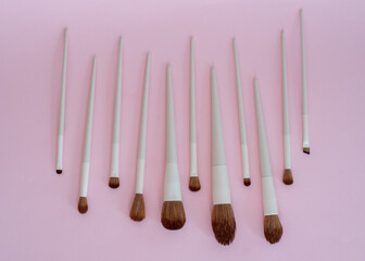 Flat lay composition with professional makeup brushes. Make-up artist kit