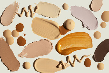 Texture of liquid smudge cosmetic cream foundation bb or cc cream sculptor swatces background