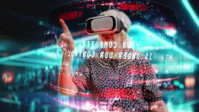 Senior woman in virtual reality headset interacting with a hologram, hacking