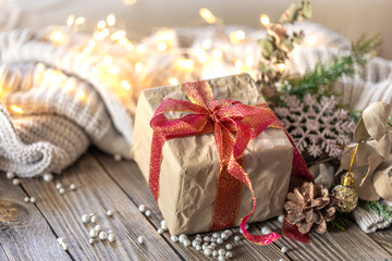 Christmas composition with a festive gift. Christmas background.