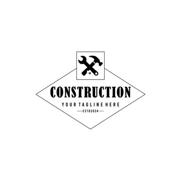 Badge logo for the building services industry, contractor, hammer and wrench symbol