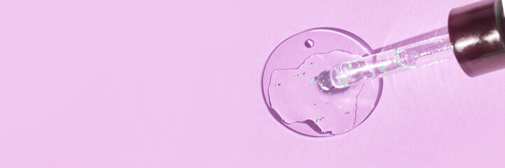 Skincare concept with serum dropper and liquid on light pink background for beauty and wellness design