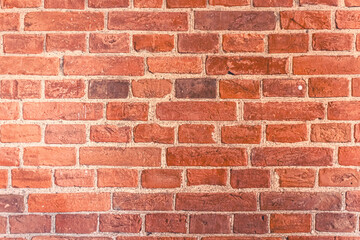 Detailed red brick wall background texture, copy space.