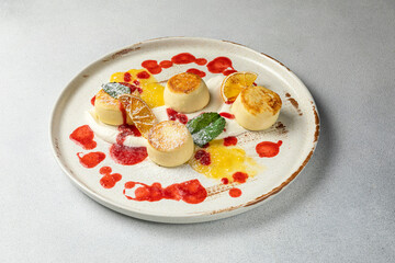 Delicious cheesecakes on a plate. Close up
