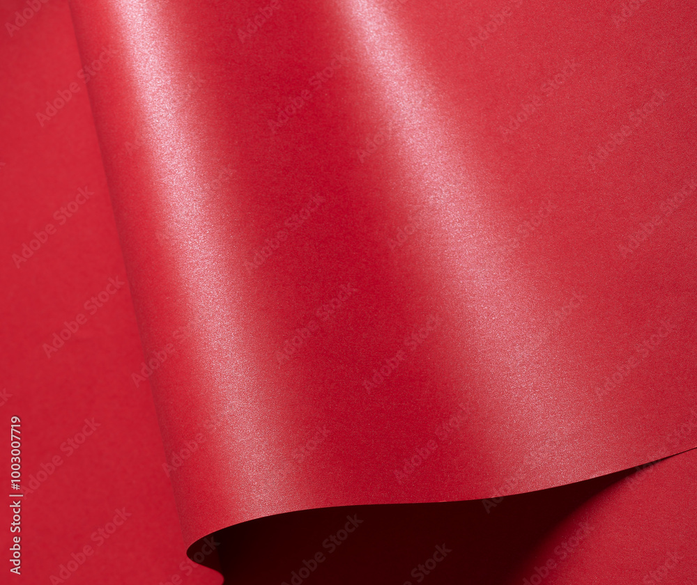 Poster a gorgeous gradient paper with saturated scarlet tones and wavy, curved lines. the glossy surface of