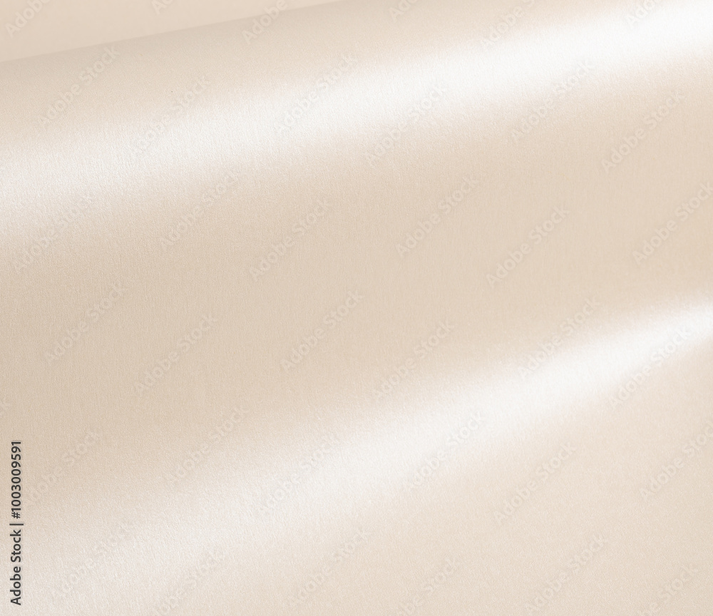 Aufkleber beige paper with a smooth, glossy sheen and reflective folds. elegant, minimal texture with a soft, 