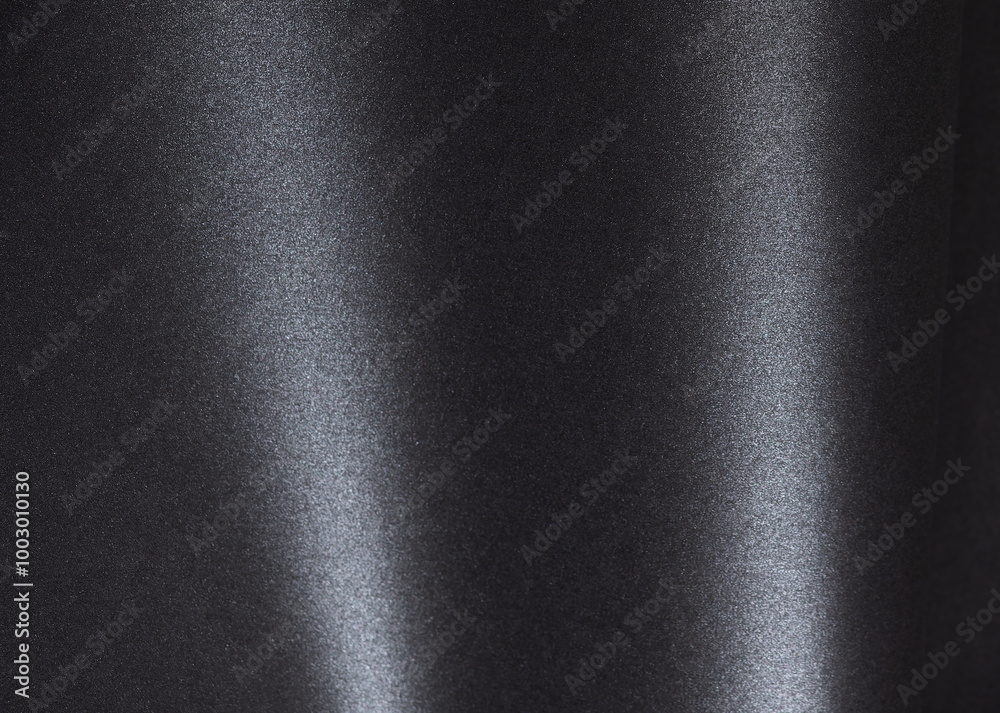 Fototapete black paper with a textured surface and minimalist monochrome background. featuring dark, elegant wa