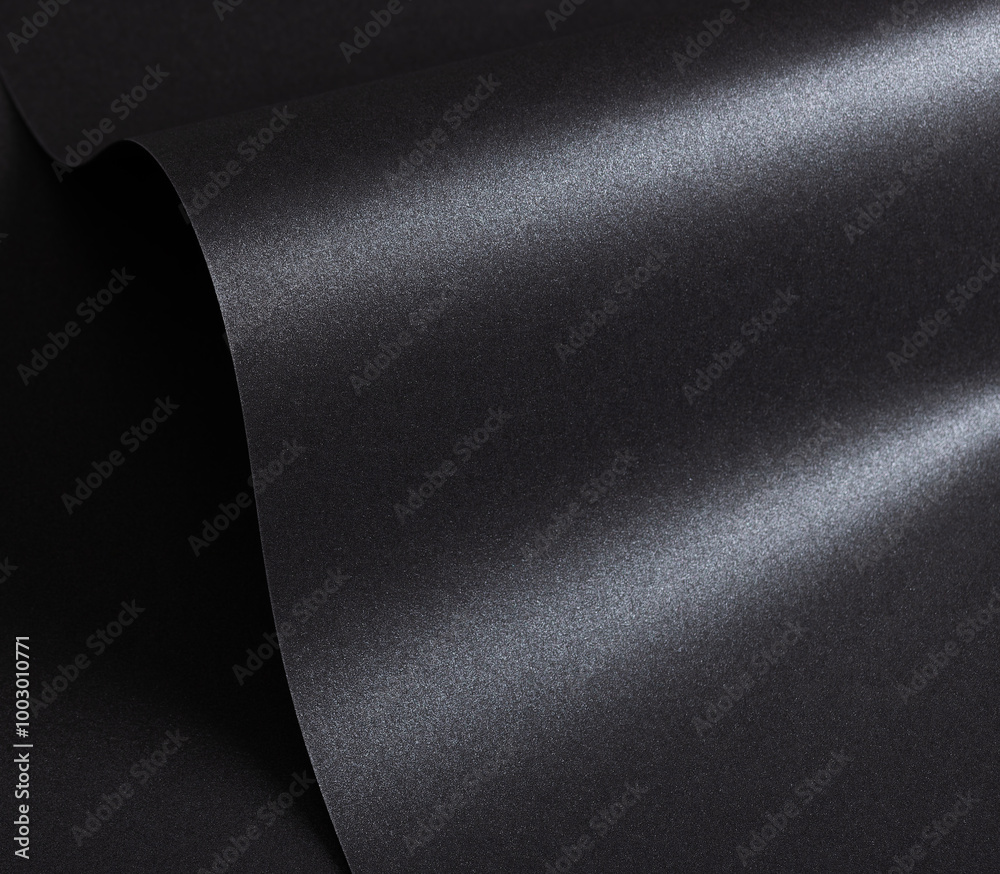 Poster black paper with a textured surface and minimalist, monochrome background. the premium structure exu