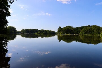The calm river in the countryside on a sunny day.