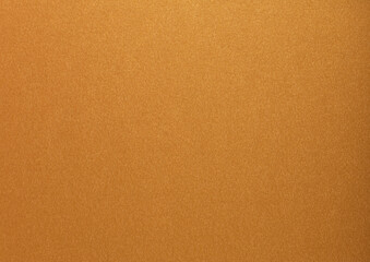 Gold paper with a glossy, metallic texture featuring soft, smooth surfaces in brass and bronze tones. The elegant and stylish design sparkles with a bright, shiny finish, perfect