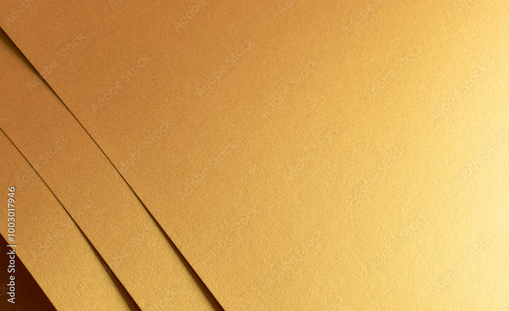 Poster golden metallic paper with a layered texture and warm brass and yellow tones. the minimalist, monoch