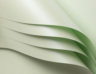 Paper with a luxurious texture and glowing gradient in soft, frosted mint and pale green tones. The minimalist, monochrome surface features layered folds and geometric lines,