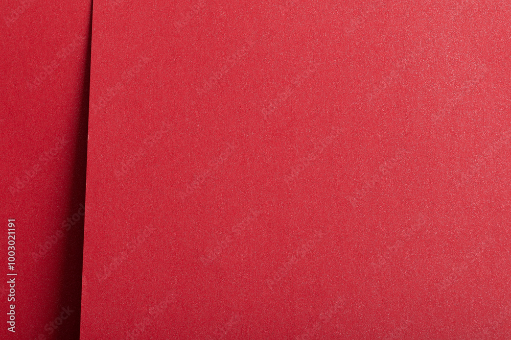 Aufkleber Paper with a rich texture and luxurious, scarlet red tone. The minimalist, monochrome surface features elegant folds and layered lines, creating a clean, premium backdrop. This