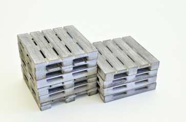Two stacks of wooden pallets