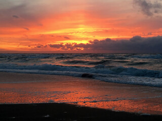 Obraz premium Dramatic sky over the Baltic Sea. Sunset on the Curonian Spit near Nida, Lithuania.