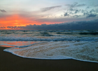 Fototapeta premium Dramatic sky over the Baltic Sea. Sunset on the Curonian Spit near Nida, Lithuania.