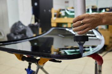 Installing windshield on a car with automotive design