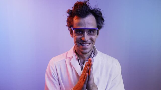 Crazy professor rubbing his hands with an evil smile