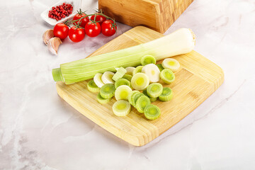 Ripe sliced leek over board