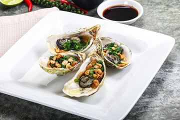 Open half oysters with green onion