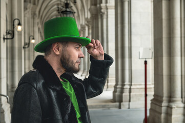 Man in green leprechaun hat. Man in green top hat for St. Patrick's Day themed content and...